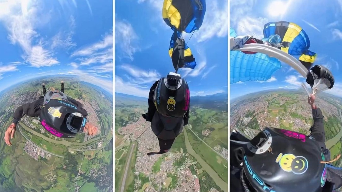 Paracaidista lucha en el aire para liberar su equipo enredado en el cuello